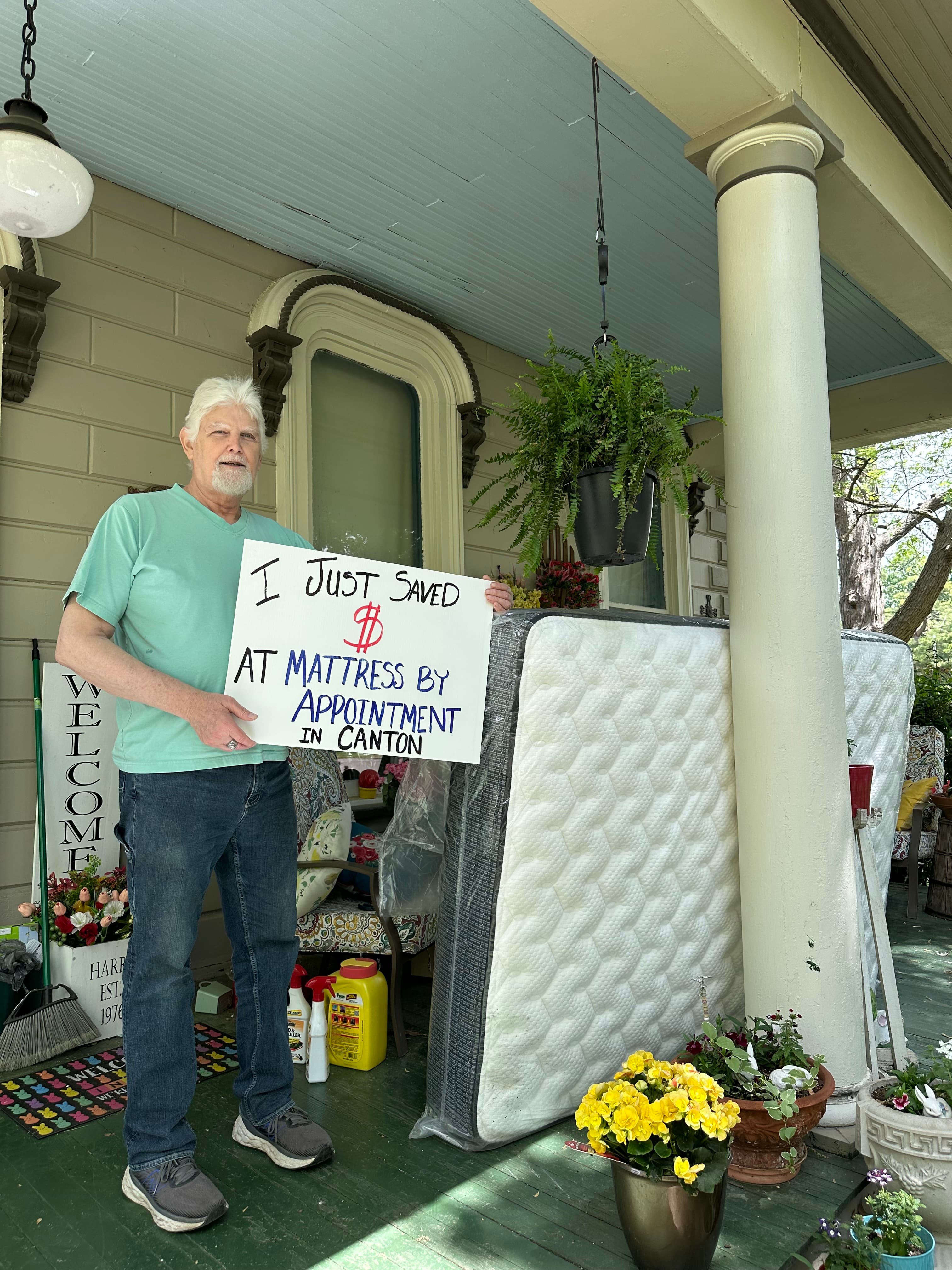 Happy customer with a new mattress from Mattress by Appointment Canton
