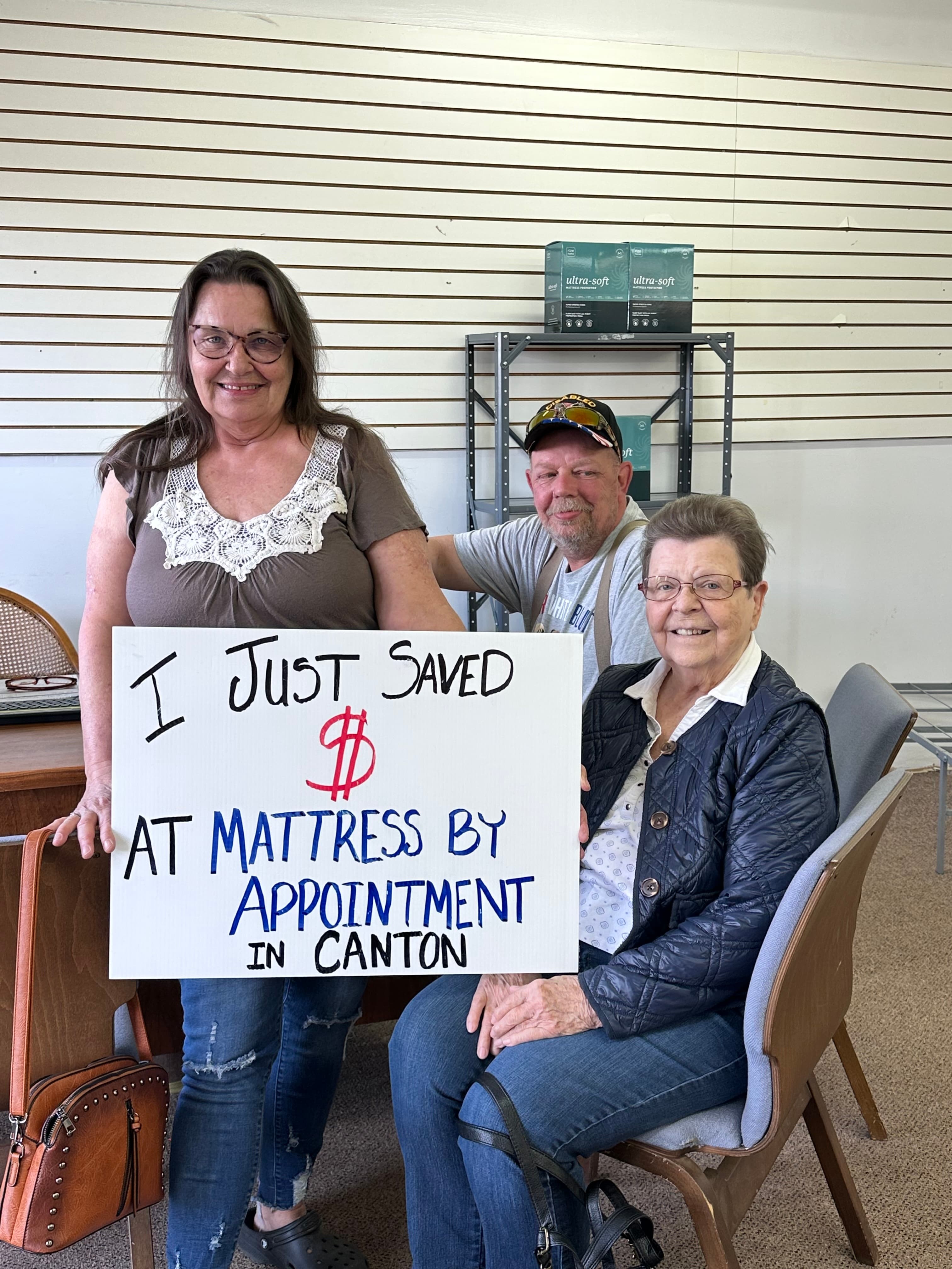 Happy customer with a new mattress from Mattress by Appointment Canton